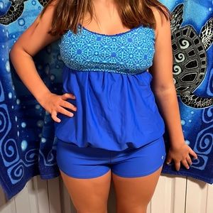 36bc in swim it’s a blue with green on top and short bottoms